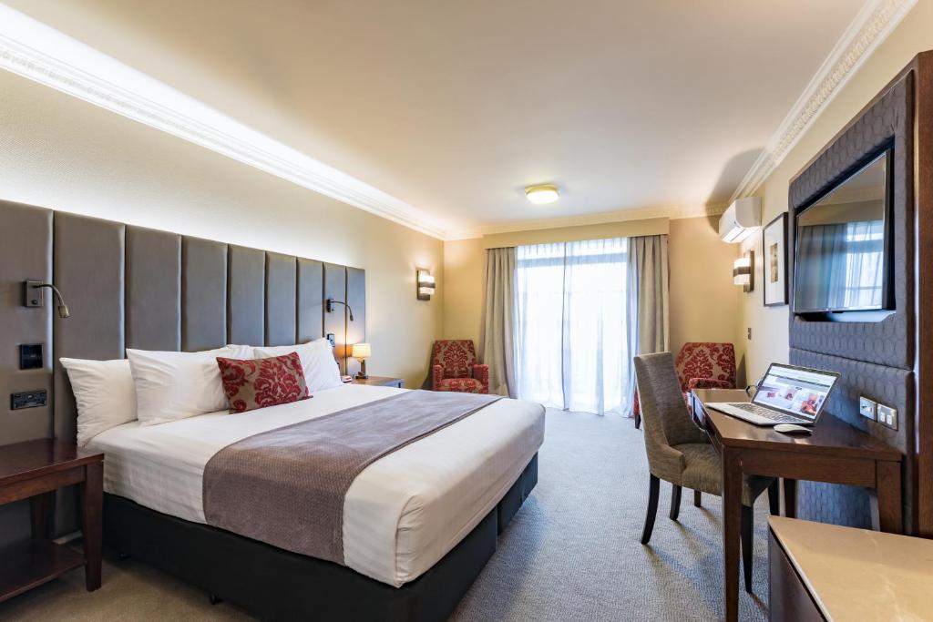 Postel nebo postele na pokoji v ubytování Distinction Hotel Rotorua