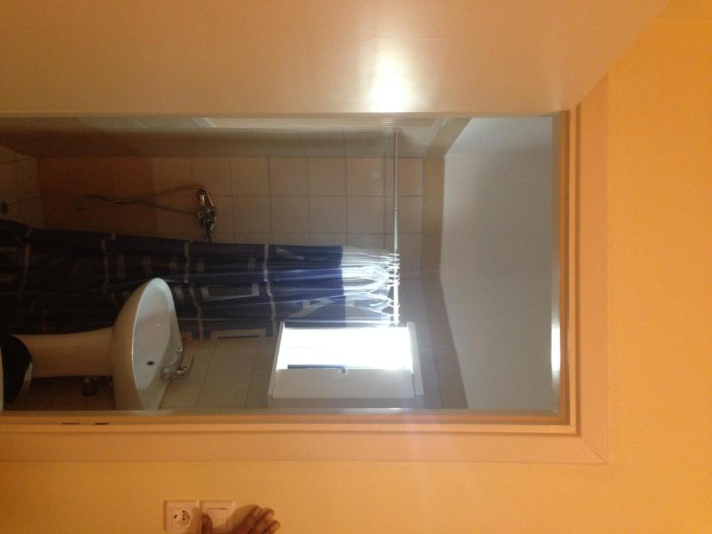 Koupelna v ubytování Marvi Hotel
