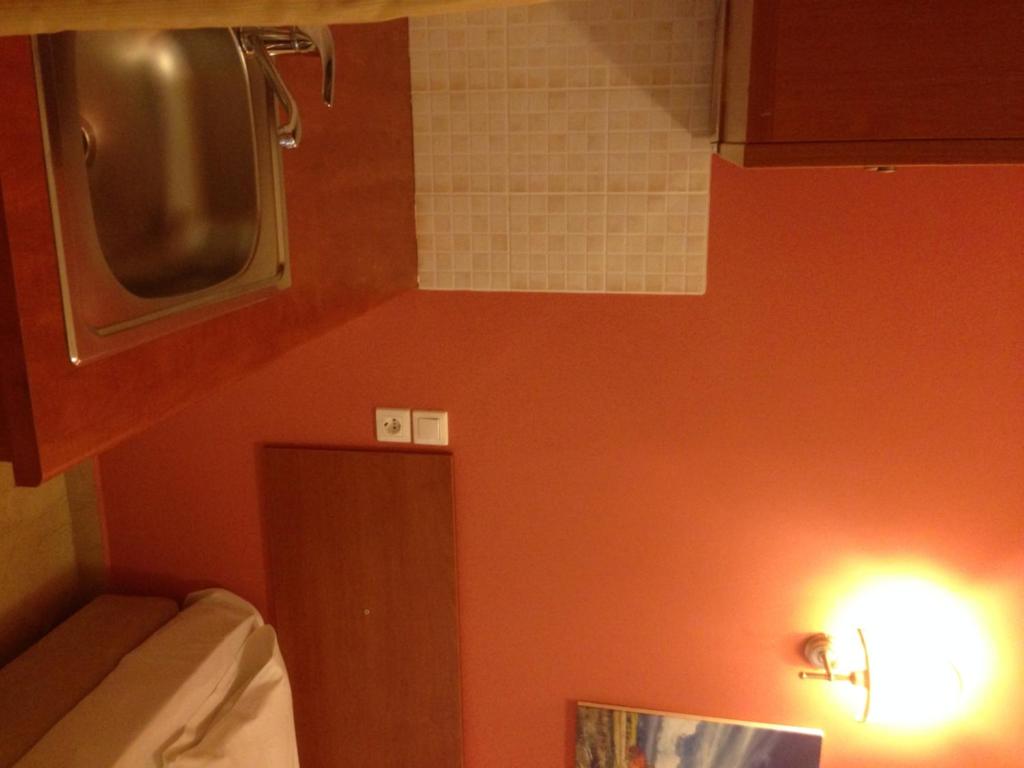 Postel nebo postele na pokoji v ubytování Marvi Hotel