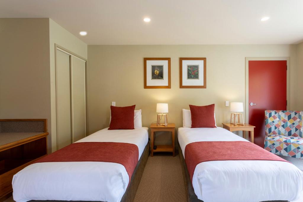 Postel nebo postele na pokoji v ubytování Te Weheka Boutique Hotel