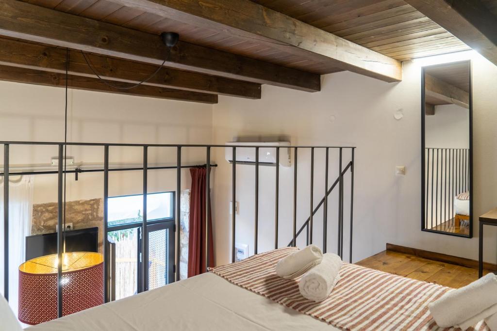 Postel nebo postele na pokoji v ubytování Quattro Domus