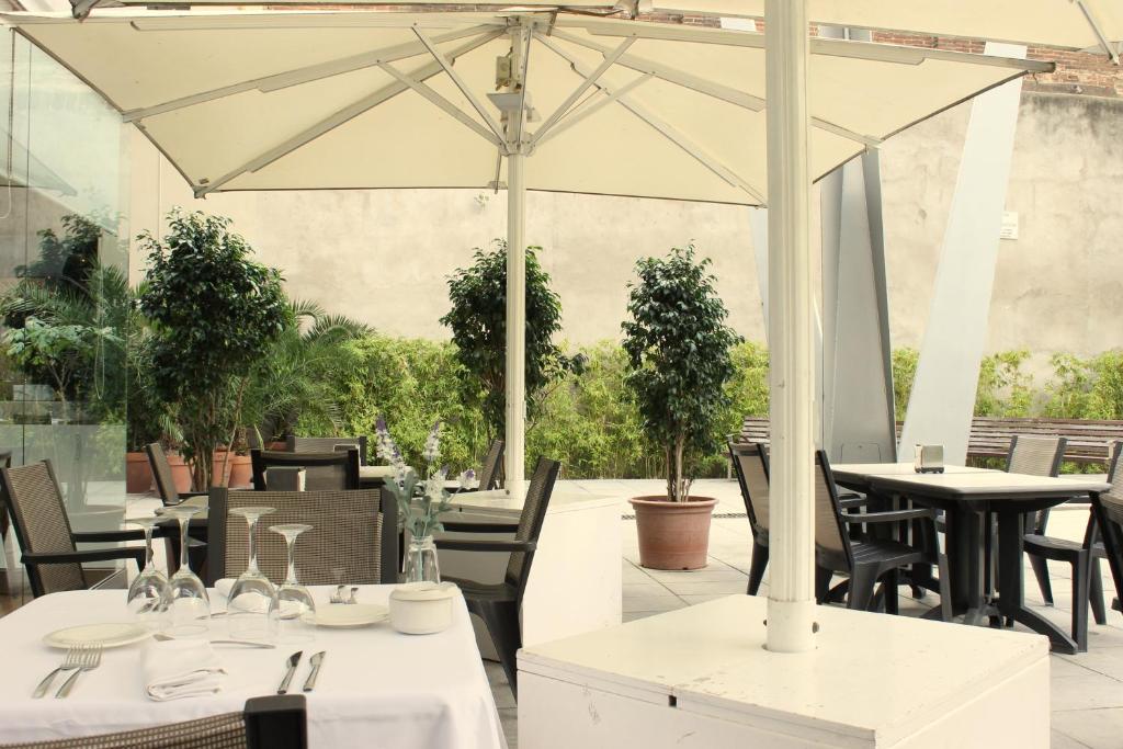 Reštaurácia alebo iné gastronomické zariadenie v ubytovaní Evenia Rossello
