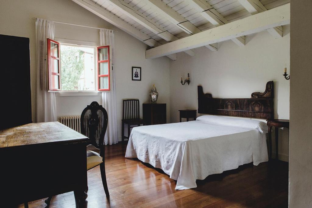 Postel nebo postele na pokoji v ubytování Hotel IRARAGORRI