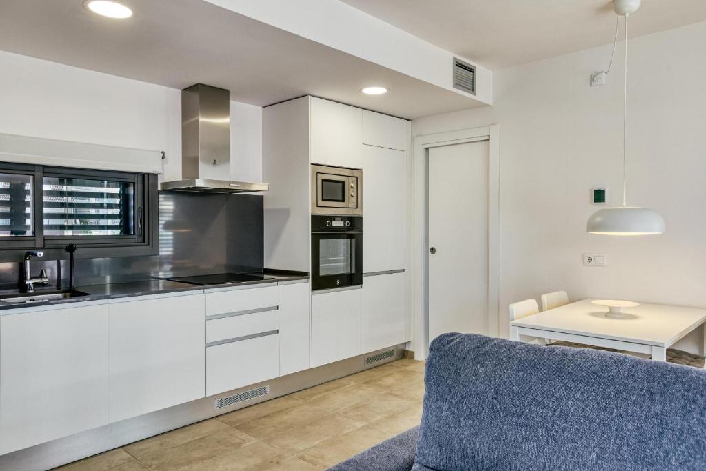 Kuchyňa alebo kuchynka v ubytovaní Murtra Apartment