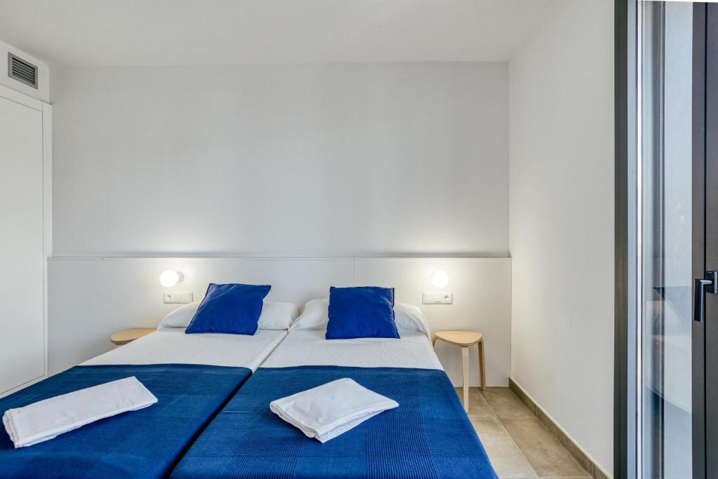 Posteľ alebo postele v izbe v ubytovaní Murtra Apartment