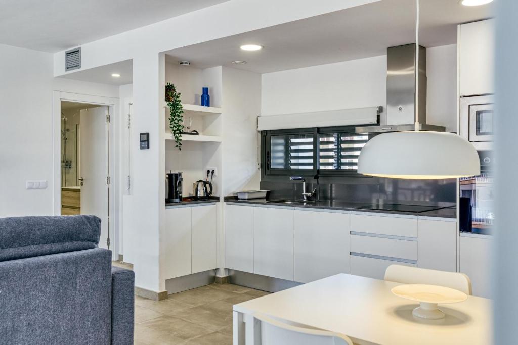 Kuchyňa alebo kuchynka v ubytovaní Murtra Apartment
