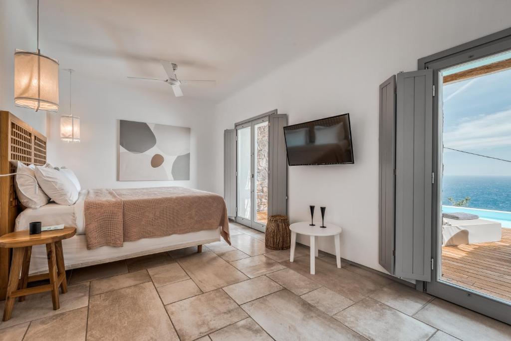 Postel nebo postele na pokoji v ubytování Alissachni Mykonos