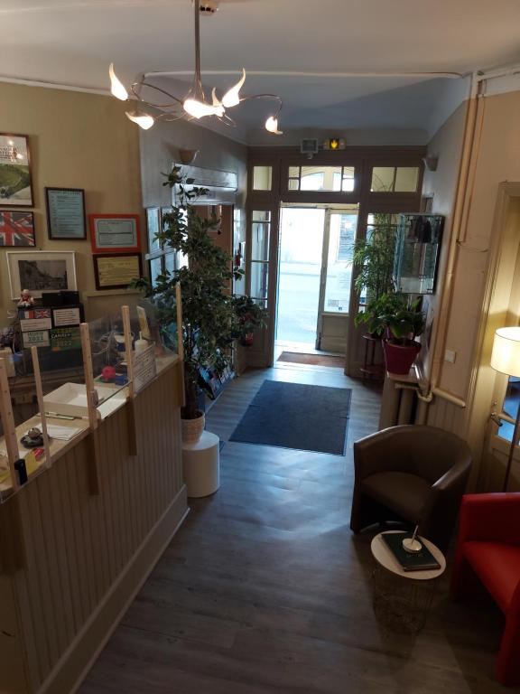Posezení v ubytování Hotel De La Paix