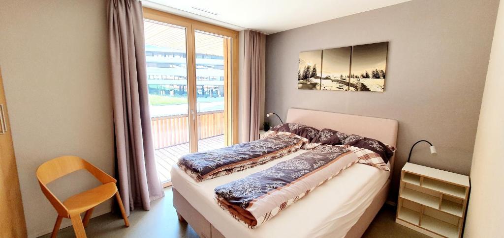 Postel nebo postele na pokoji v ubytování Ferienwohnung Stenna Allegra