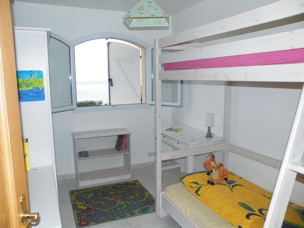 Postel nebo postele na pokoji v ubytování Villa Liamone