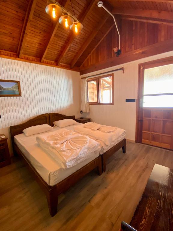 Postel nebo postele na pokoji v ubytování Ankh Pension