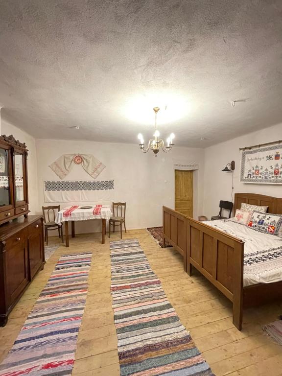Postel nebo postele na pokoji v ubytování Saschiz 175 GuestHouse