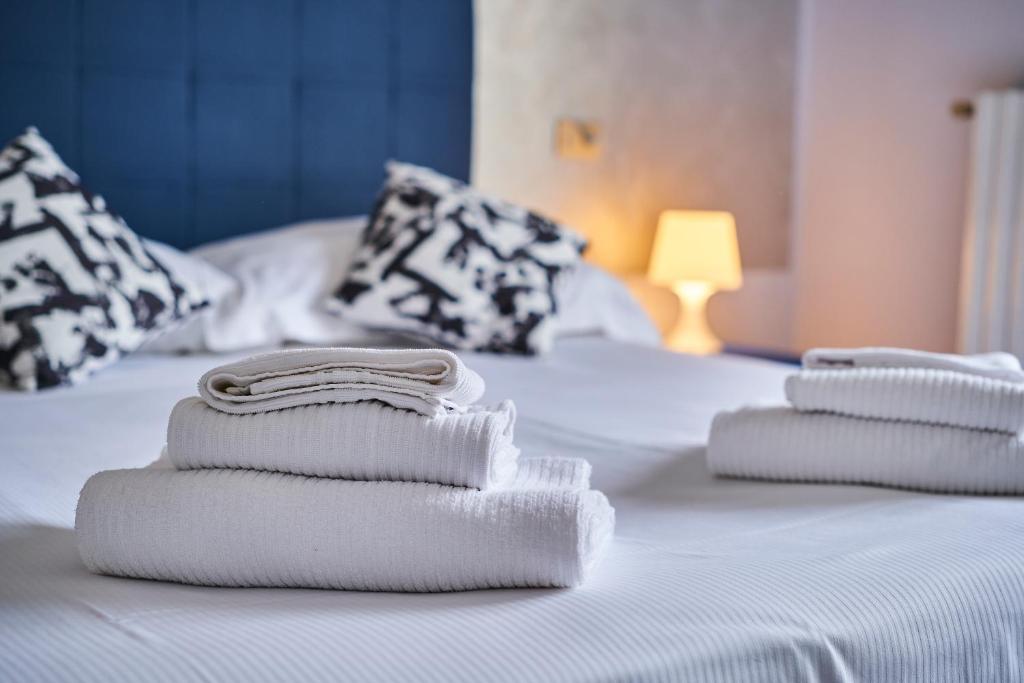 Postel nebo postele na pokoji v ubytování HOTEL VITTORIA
