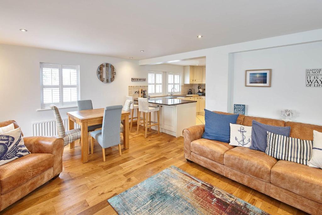 a living room with a couch and a table at Host & Stay - Doray House in Newton-by-the-Sea