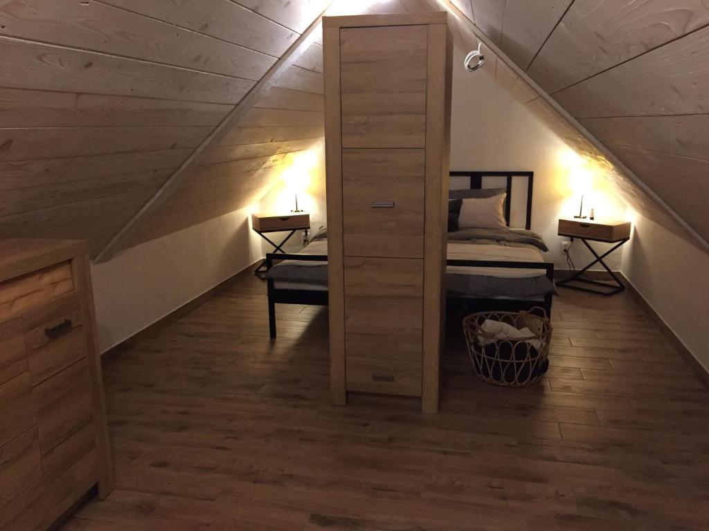 Postel nebo postele na pokoji v ubytování Babushka Noclegi