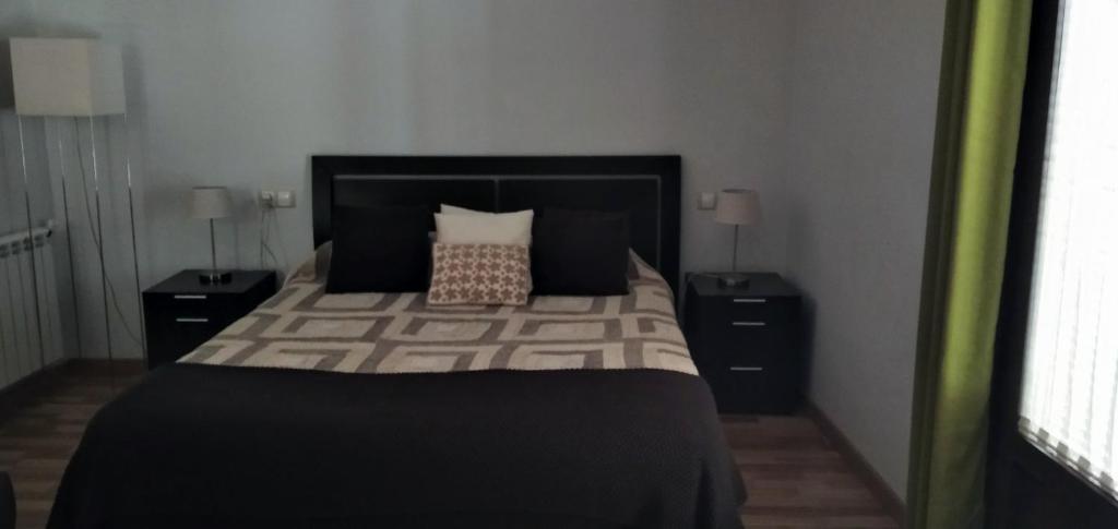 Posteľ alebo postele v izbe v ubytovaní Petit Hotel Porrera