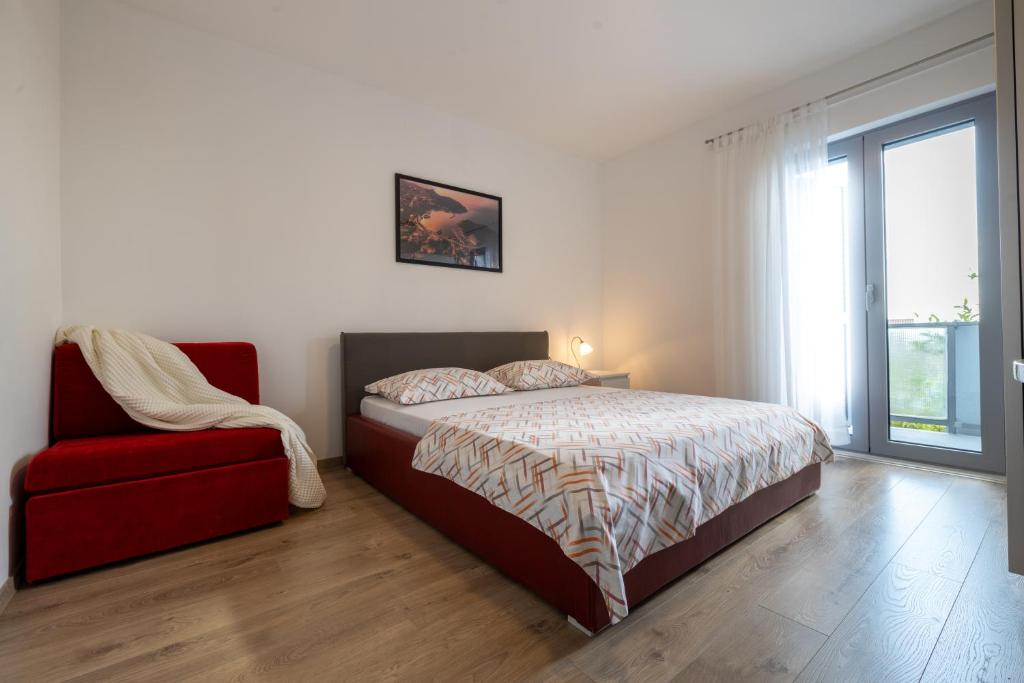 Postel nebo postele na pokoji v ubytování Family apartments - Guesthouse Vranješ