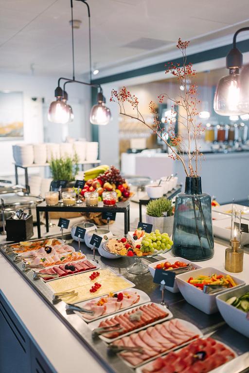 a buffet line with many different types of food at Ice Hotel in Jukkasjärvi