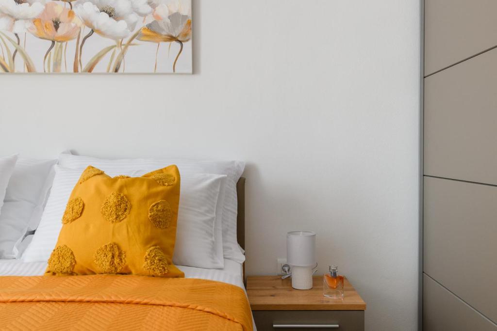 Posteľ alebo postele v izbe v ubytovaní Cosy apartment Klara