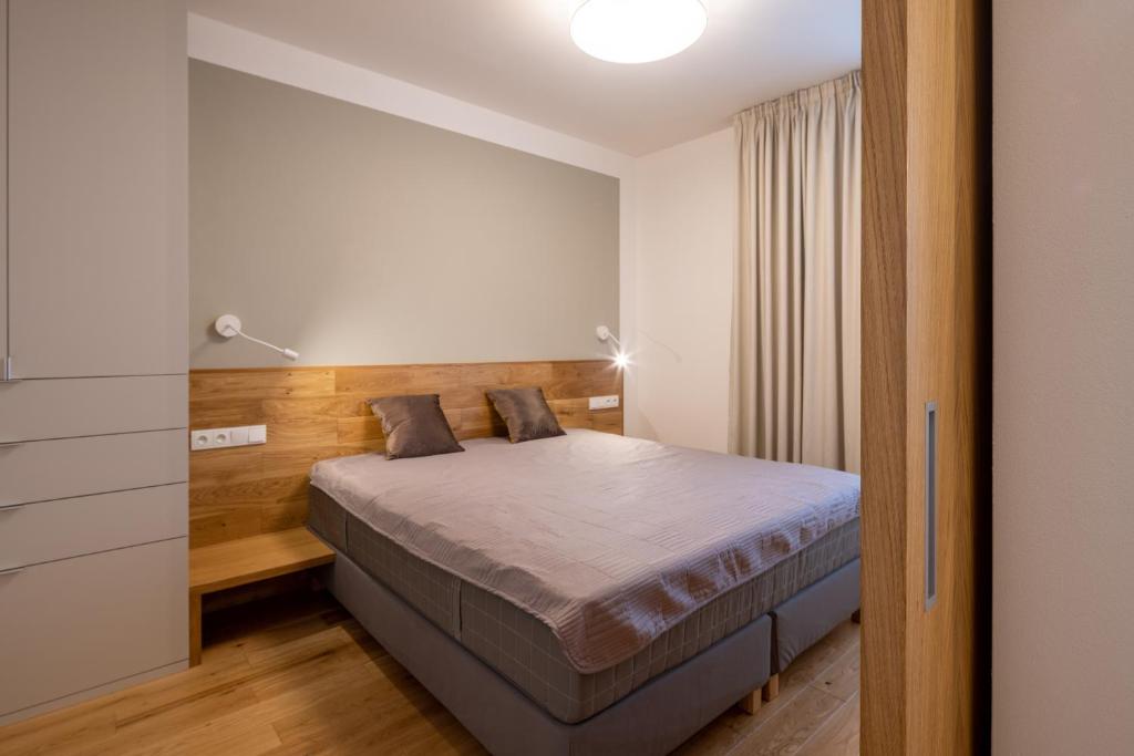 Łóżko lub łóżka w pokoju w obiekcie Apartments Marinka Litomyšl