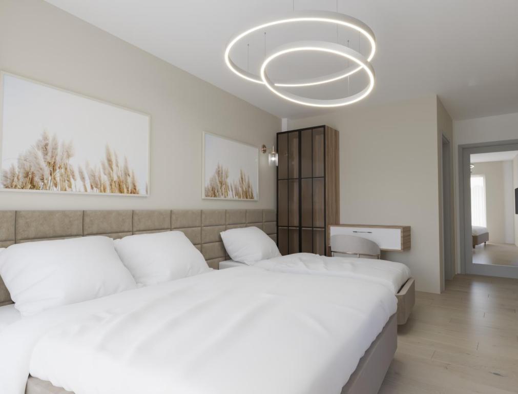 Postel nebo postele na pokoji v ubytování Struga Riverview Hotel