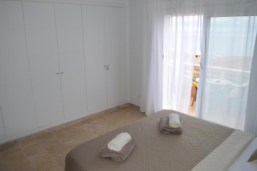 Postel nebo postele na pokoji v ubytování Ocean Romance (Duplex)