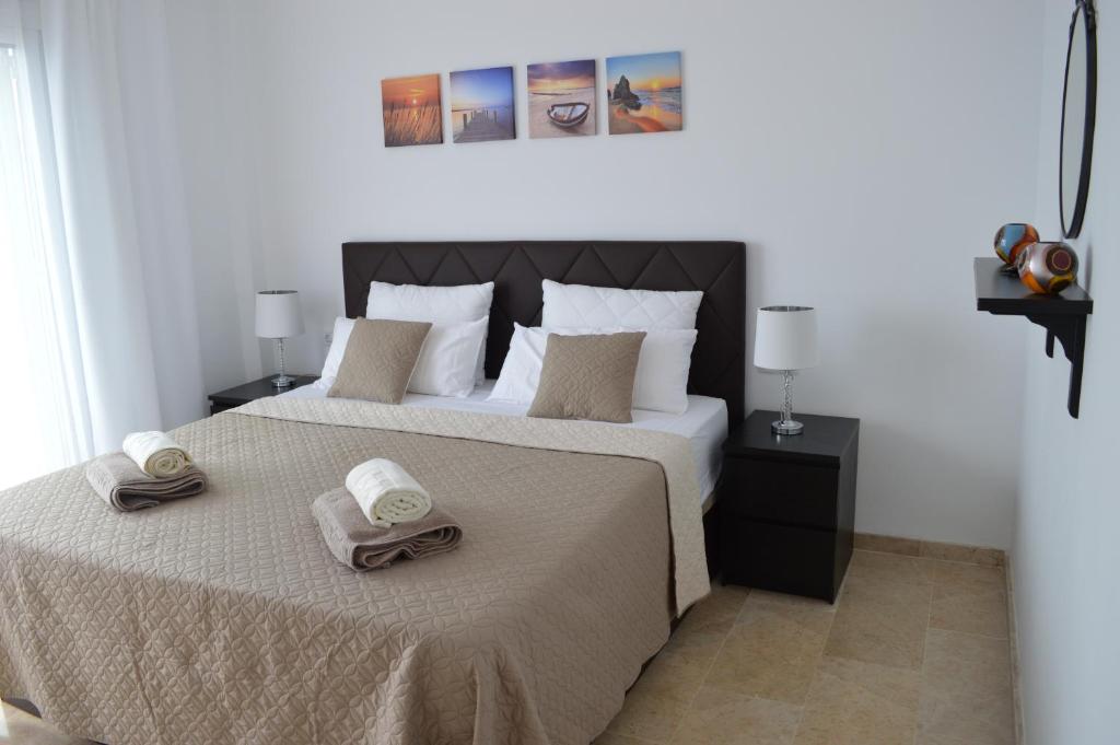 Postel nebo postele na pokoji v ubytování Ocean Romance (Duplex)
