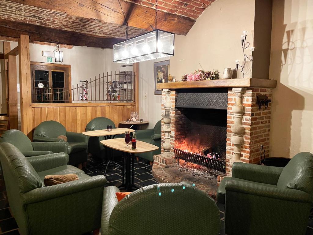 Posezení v ubytování Hotel het Elsland