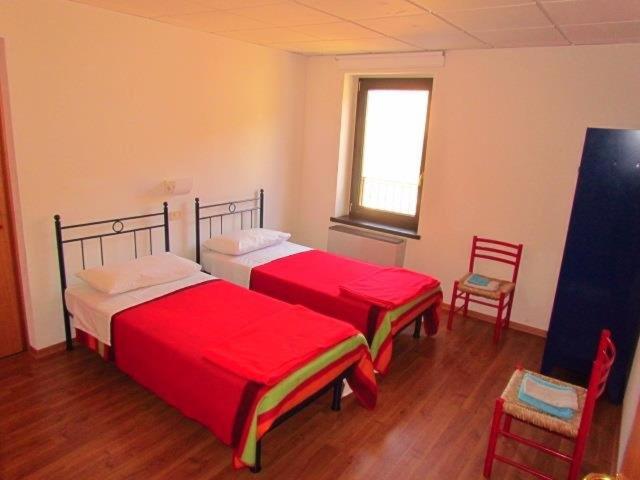 Letto o letti in una camera di Ex Latteria di Platischis