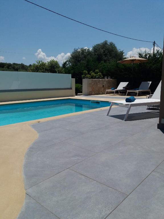 The swimming pool at or close to Chania Olive Home