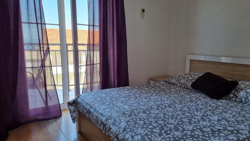 Postel nebo postele na pokoji v ubytování Apartmani Five