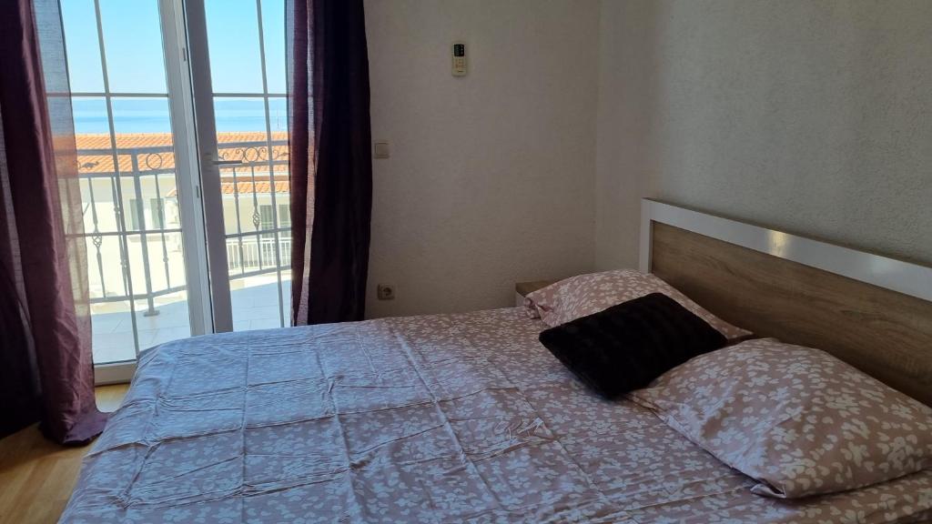 Postel nebo postele na pokoji v ubytování Apartmani Five