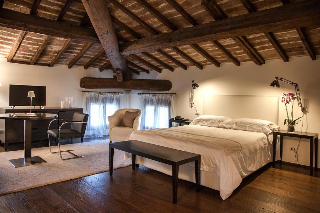 Katil atau katil-katil dalam bilik di Relais Villa Ormaneto