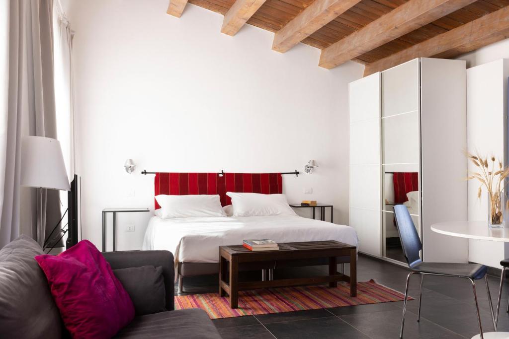 Postel nebo postele na pokoji v ubytování Masseria del Carrubo