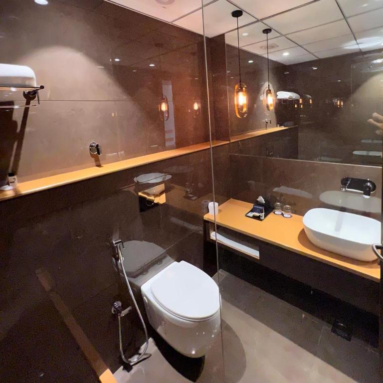 Koupelna v ubytování Palasa Hotel