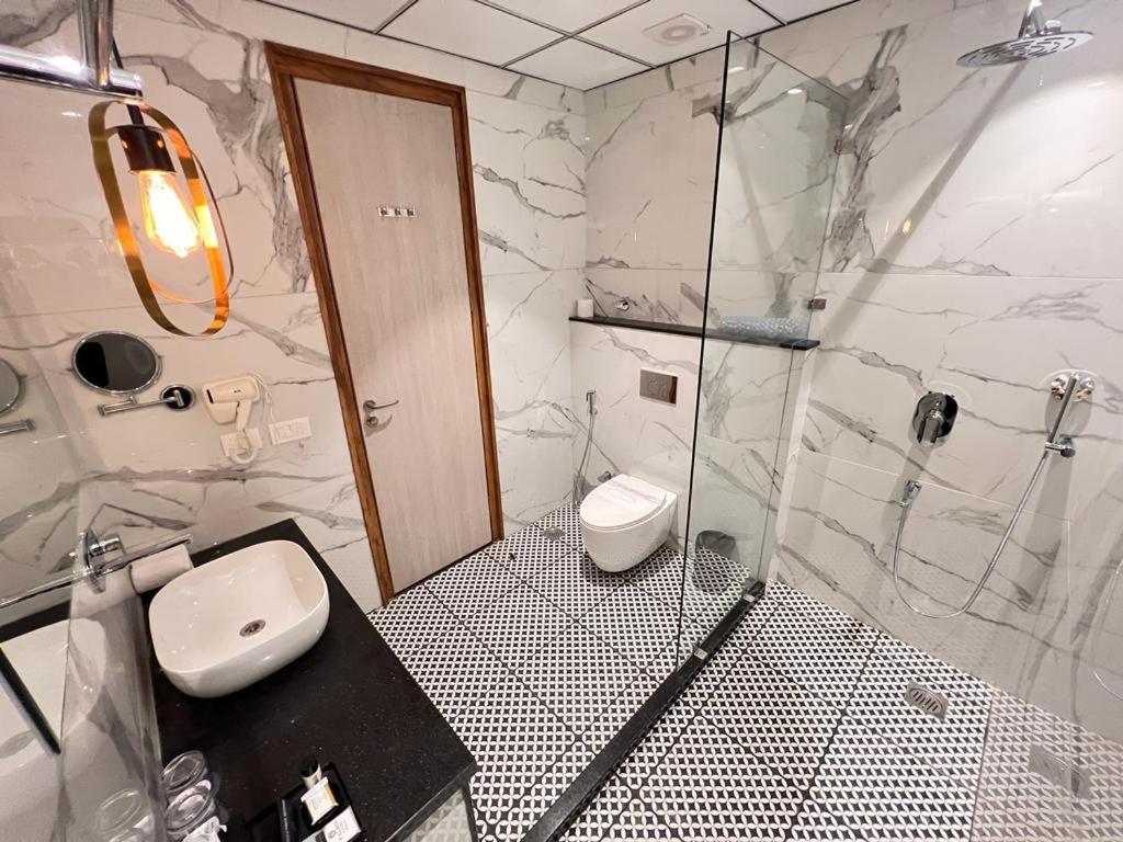 Koupelna v ubytování Palasa Hotel