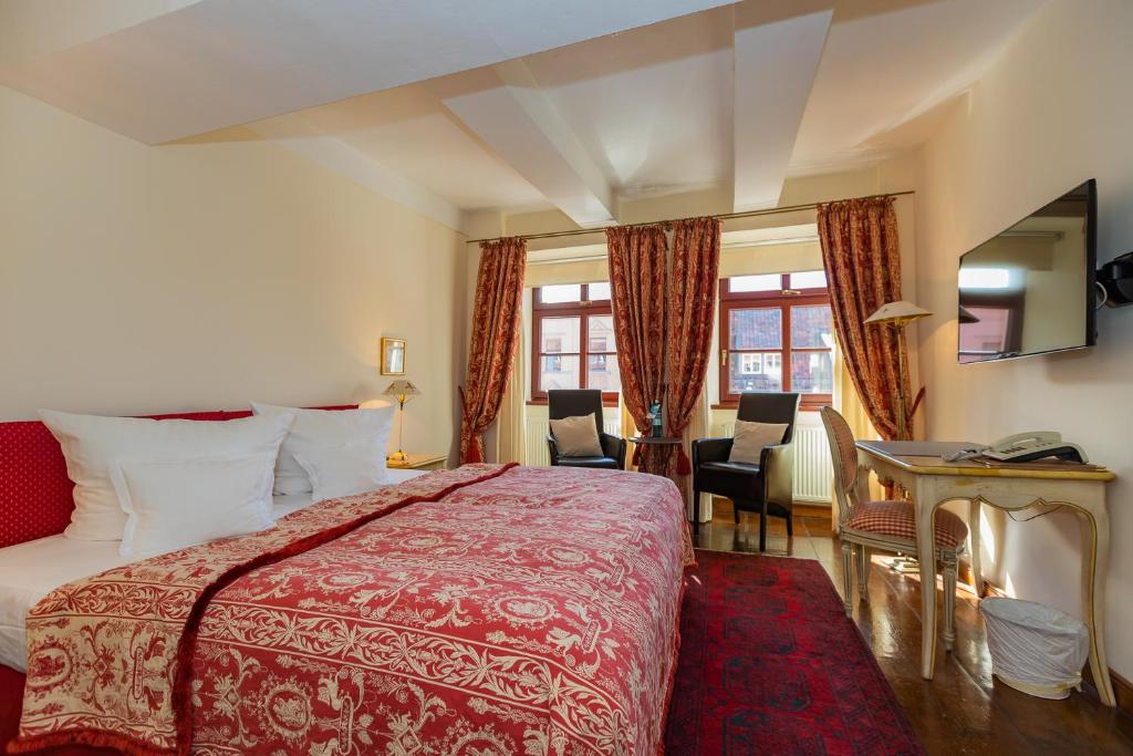 Postel nebo postele na pokoji v ubytování Hotel Zum Bär