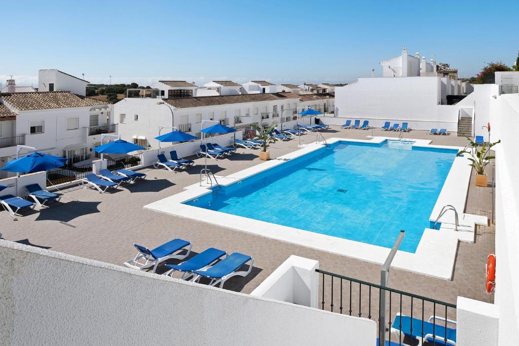 an image of a swimming pool on top of a building at Casa Begines in Vejer de la Frontera