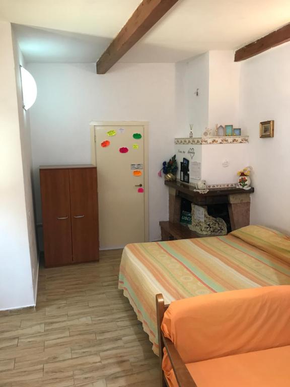 Ένα ή περισσότερα κρεβάτια σε δωμάτιο στο Nido d'amore a Terracina