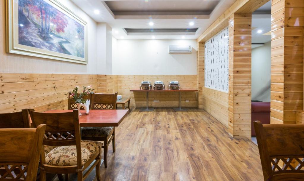 Posezení v ubytování Treebo House Inn