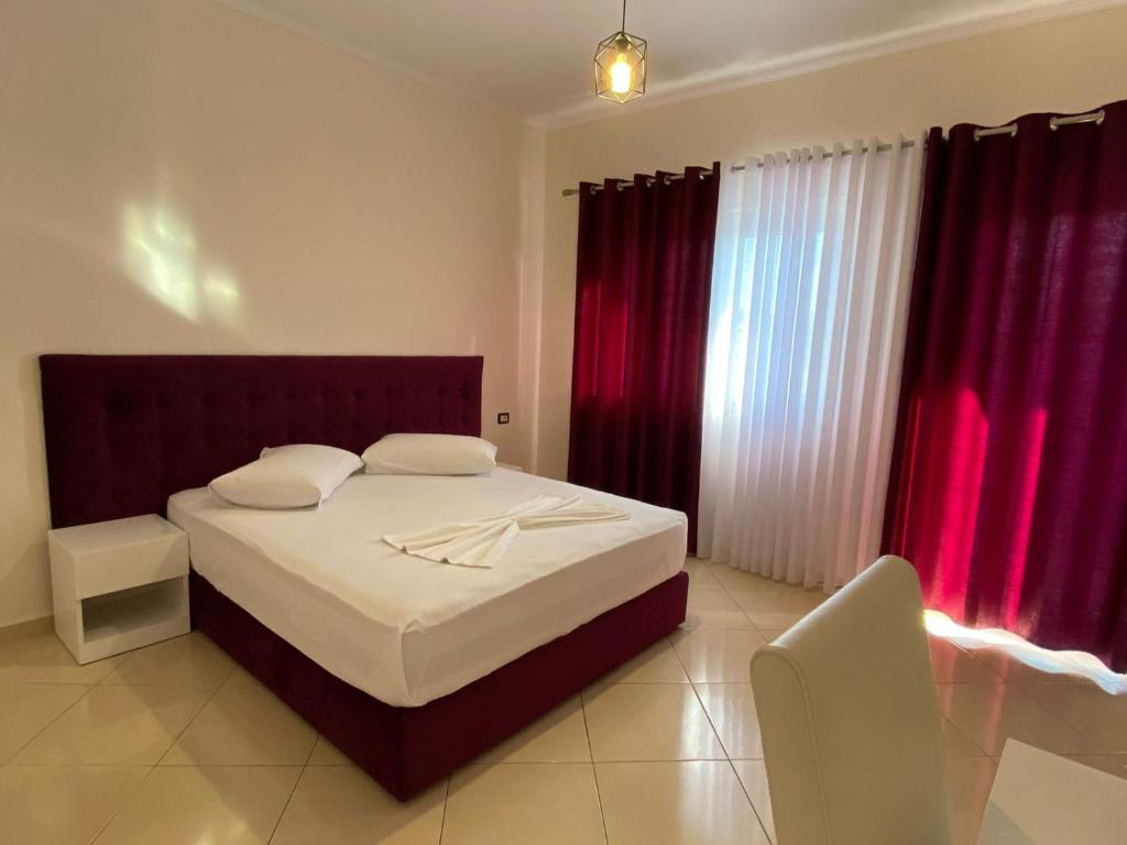 Cama o camas de una habitación en Hotel Kaloshi