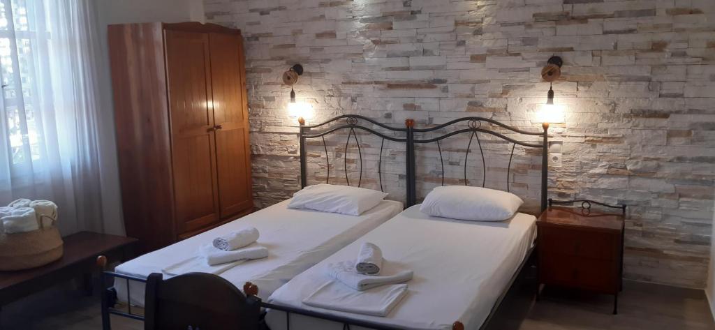 Posteľ alebo postele v izbe v ubytovaní Ioanna Apartments