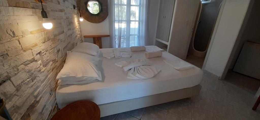 Posteľ alebo postele v izbe v ubytovaní Ioanna Apartments