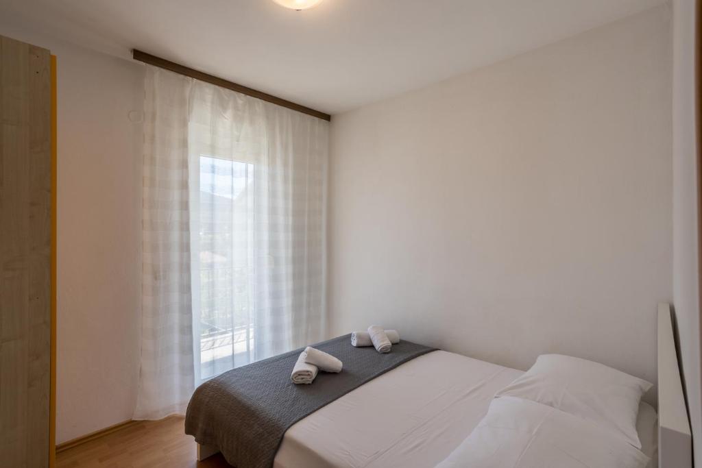 Posteľ alebo postele v izbe v ubytovaní Compelx with detached house and spacious apartment