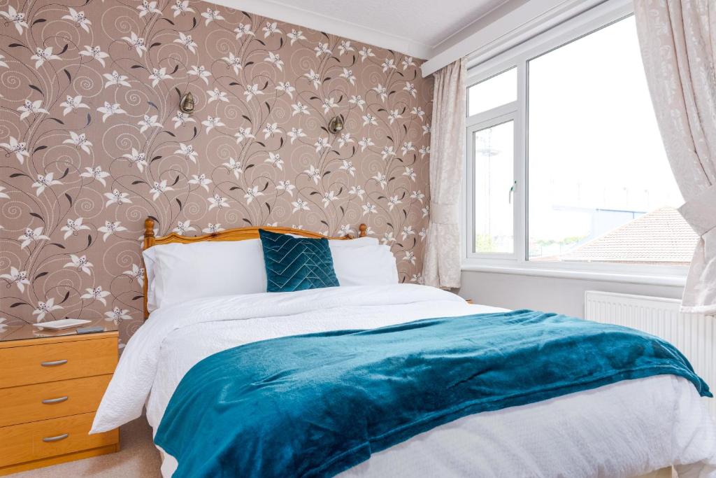 Postel nebo postele na pokoji v ubytování Morningside Hotel