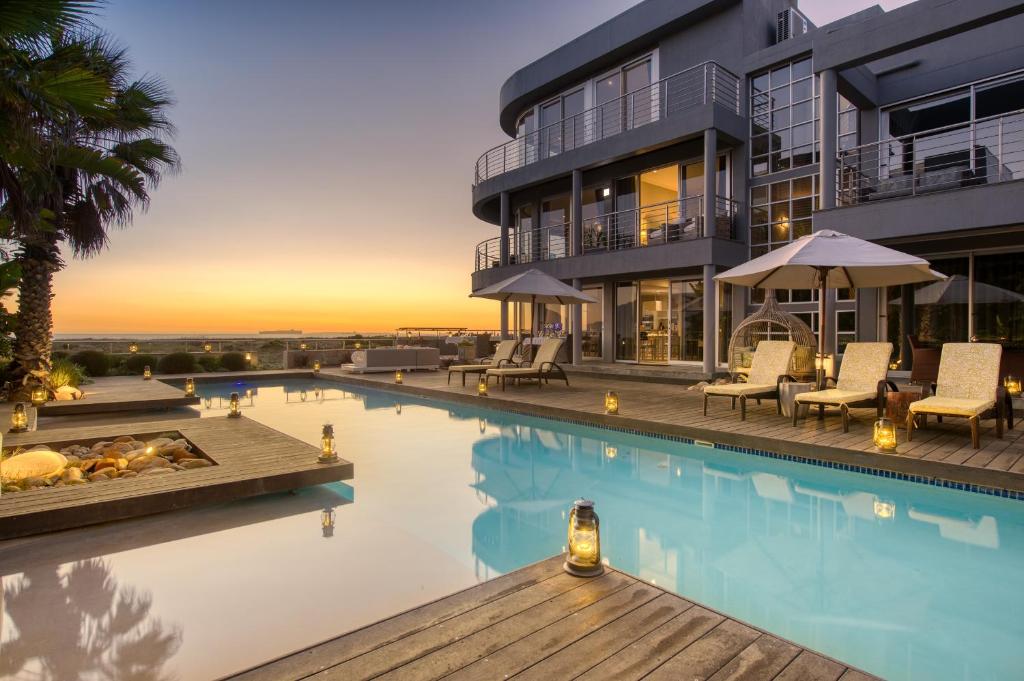 an image of a house with a swimming pool at Atlantic Palms in Cape Town