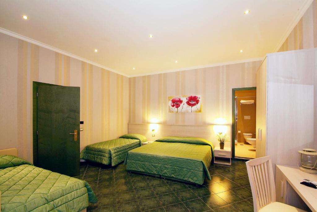 Posteľ alebo postele v izbe v ubytovaní Hotel Argentina