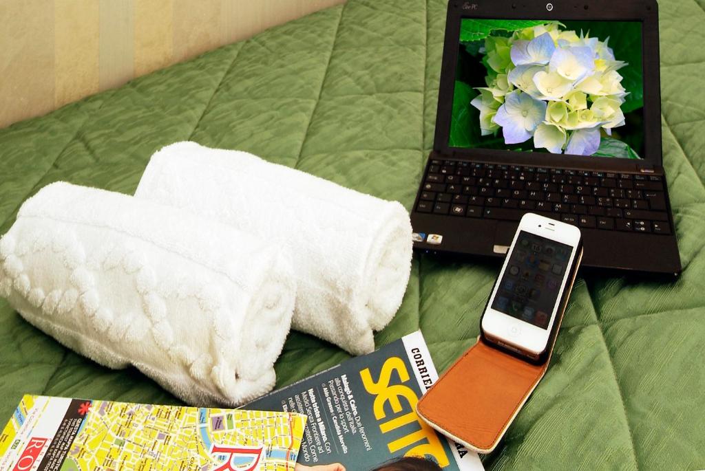 Posteľ alebo postele v izbe v ubytovaní Hotel Argentina