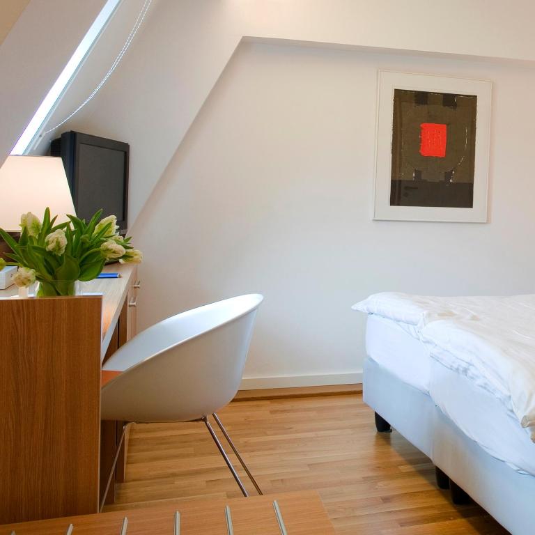 Postel nebo postele na pokoji v ubytování Hotel Simoncini