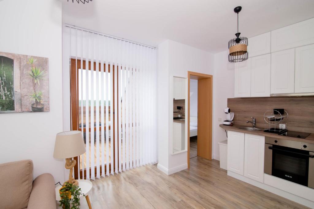 Kuchyň nebo kuchyňský kout v ubytování Four seasons apartment - Oasis beach resort